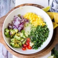 Remaining ceviche ingredients finely diced and added to a plate