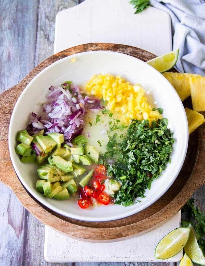 Remaining ceviche ingredients finely diced and added to a plate