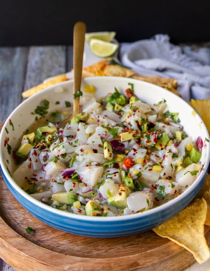 Ready to marinade ceviche in a bowl going into the fridge
