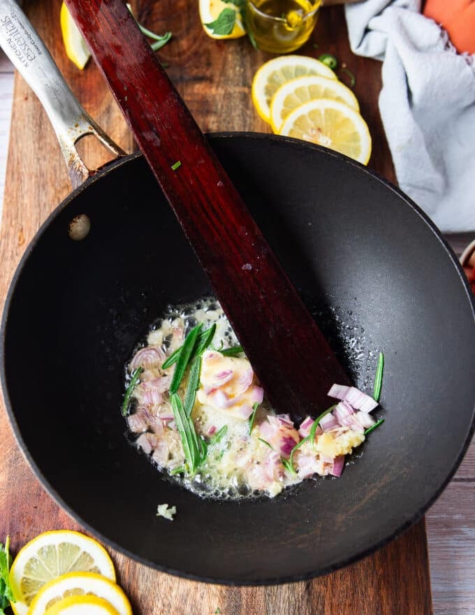 Shallots and garlic sautéed in a large skillet