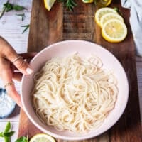 the cooked pasta is added to a bowl