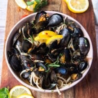 mussels and juices and sauces added over the cooked pasta and tossed well to finish the dish