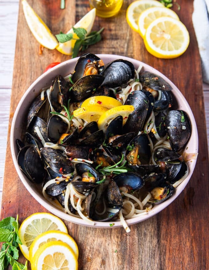 mussels and juices and sauces added over the cooked pasta and tossed well to finish the dish