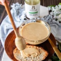Whipped honey being spread over toast showing the texture