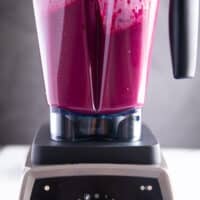 beet smoothie blending in a high speed blender