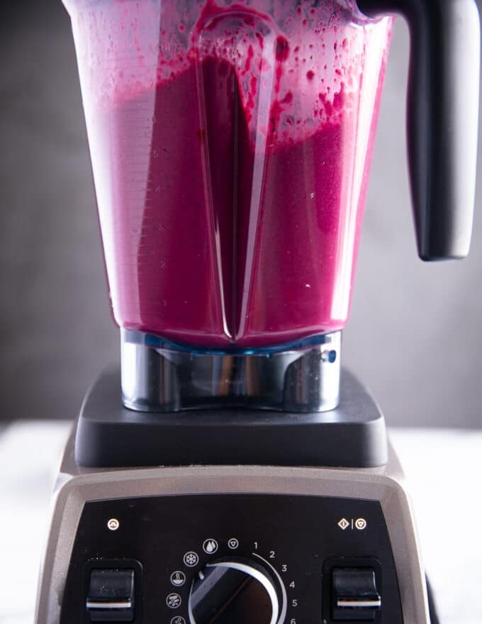 beet smoothie blending in a high speed blender